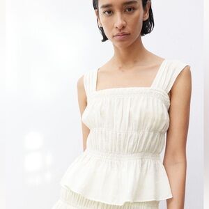 H&M “Crêpe peplum top”